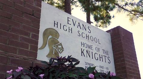 Suspects arrested after being found with gun on Evans High campus ...