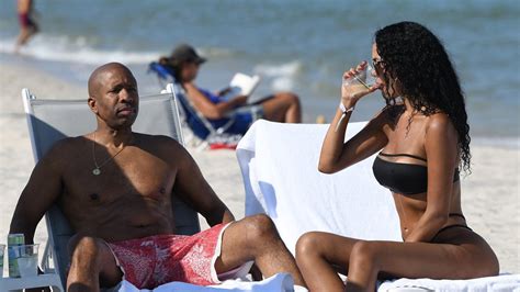 Kenny Smith Ditches Shirt For Beach Day With Bikini Beauty