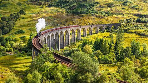 Jacobite steam train on the Glenfinnan Viaduct Inverness-shire Scotland ...