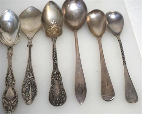 12 ANTIQUE STERLING SILVER SPOONS