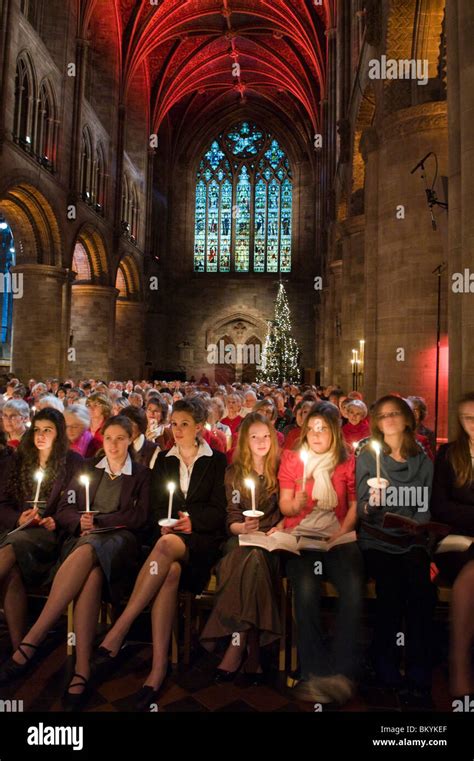 Congregation singing and holding candles during filming of BBC Songs of ...