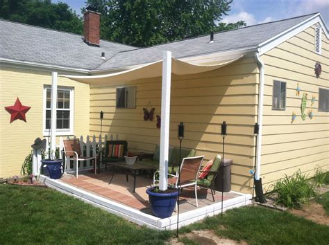 DIY shade canopy. Using planters, fence posts, buckets, quick Crete ...