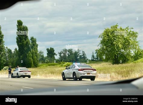 Two Dodge Charger Oregon State Police cars stopped on I-5 North Oregon ...