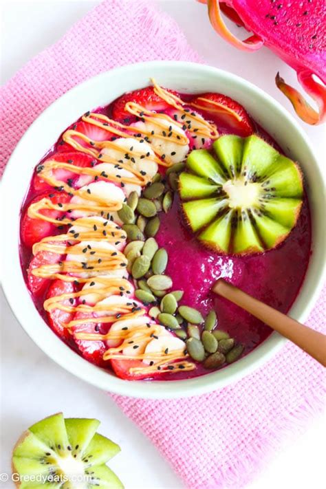 Dragon fruit smoothie bowl with kiwi, strawberry and seeds