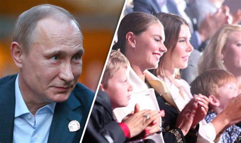 Putin's 'lover' Alina Kabaeva pictured with children wearing wedding ...