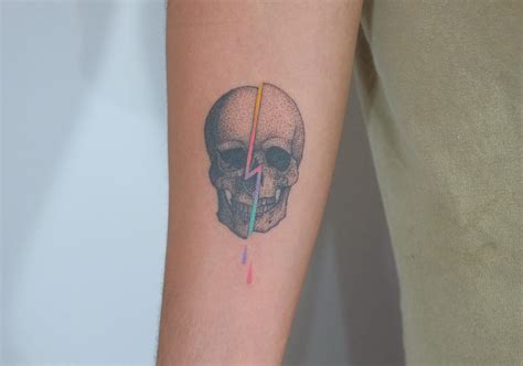 Divided skull by Yaroslav Putyata - Tattoogrid.net