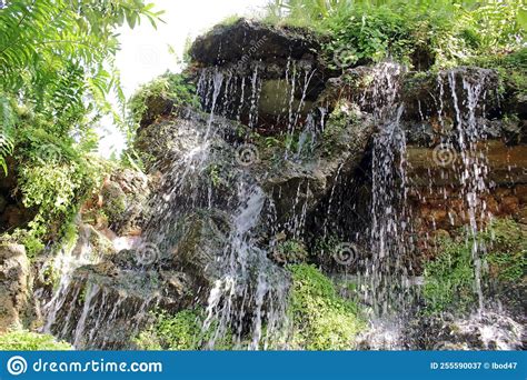 Big Waterfall in a Landscaped Rock Garden in Summer Stock Image - Image ...