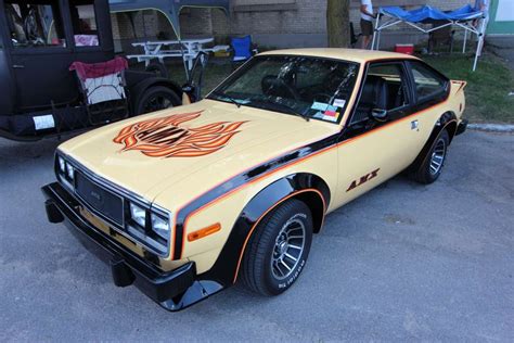 The AMC Spirit AMX has stickers and wheel flares.