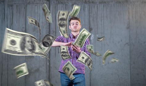 businessman making the rain of money 12425064 Stock Photo at Vecteezy