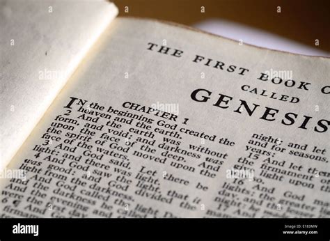 Bible open at the first page of the Book of Genesis Stock Photo - Alamy