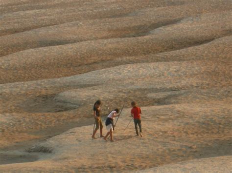 Laos 005 | Kids playing on the banks of the Mekong at sunset ...