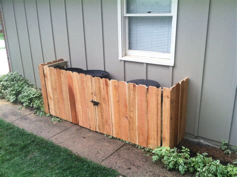 Minimalist Backyard with Diy Garbage Can Storage Ideas, Round Black ...