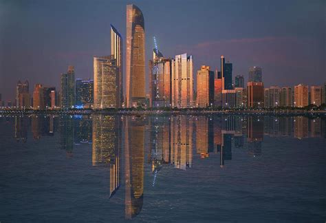 Abu Dhabi skyline night Photograph by Adrian Watkins | Pixels