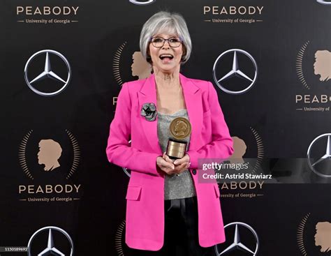 Rita Moreno poses with her Peabody Career Achievement Award in the ...