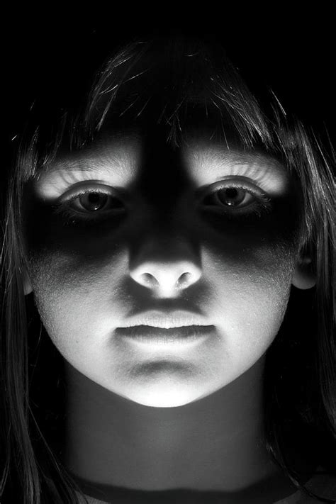 Scary kid with light shining up on her face Photograph by Kyle Lee ...