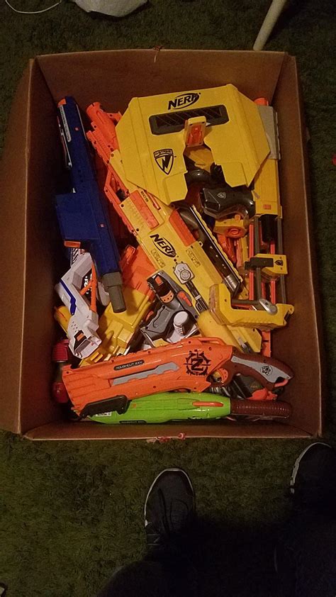 I just picked up this gigantic box of Nerf Guns, attachments, and ...