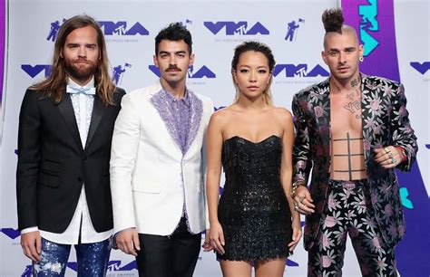 Joe Jonas Sets DNCE Return, Teases New Song 'Dancing Feet' | Us Weekly