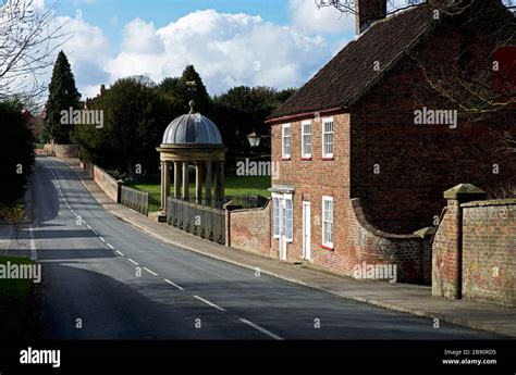 The old butcher's shop in the estate village of Sledmere, East ...