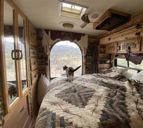 Check out this incredible DIY RV. It's a "log cabin" on wheels! - RV Travel