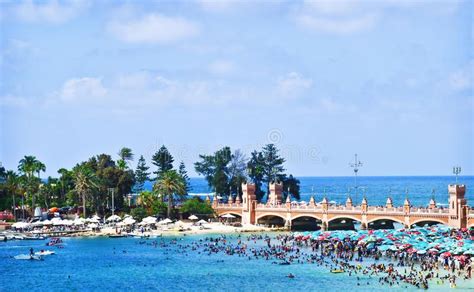 The Beach, Alexandria Egypt. A beach filled with people and umbrellas ...