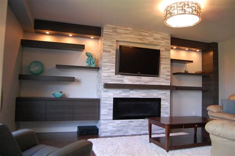 Built in shelving around fireplace and tv | Contemporary fireplace ...