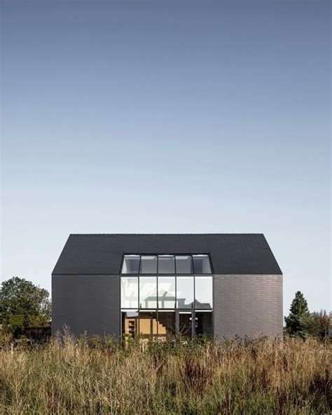 Black Barn-Inspired Minimalist House In The Netherlands - DigsDigs