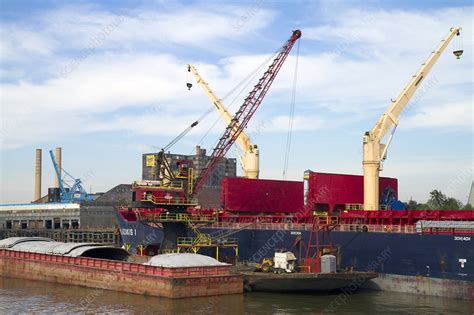 Crane Loading a Barge with Coal - Stock Image - C012/3037 - Science ...