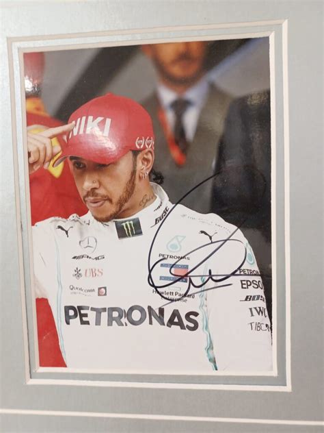 LEWIS HAMILTON SIGNED PHOTO WITH SHIRT – Signed Memorabila Shop