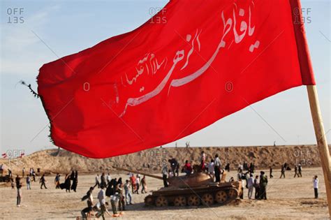 People and tank near flag from the Iran-Iraq War, Ahwaz, Iran stock ...