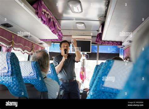 Bus tour guide on microphone hi-res stock photography and images - Alamy