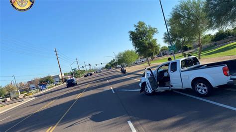 Man arrested after head-on crash into Peoria police vehicle