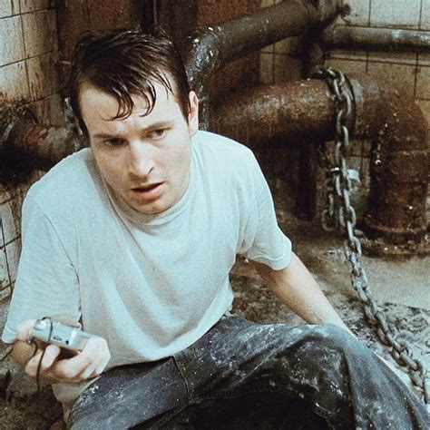 Leigh Whannell as Adam Stanheight in Saw (2004) | Saw film, Jigsaw saw ...