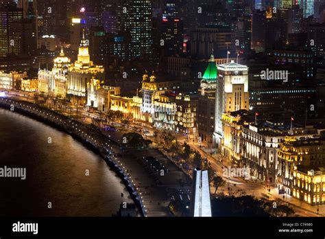 Shanghai night skyline (view along Huangpu River and the Bund ...