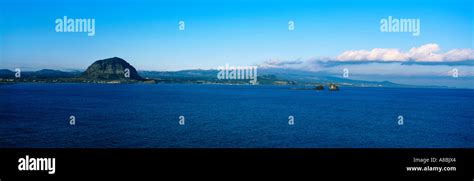 Jeju Island shoreline in view of sunrise peak Stock Photo - Alamy