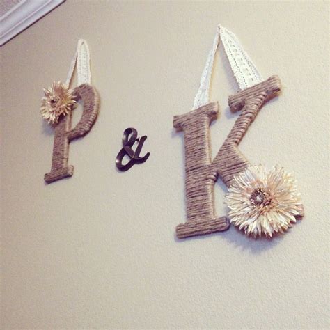 Plain wooden letters from Hobby Lobby, wrap in Jute, add your own ...