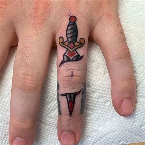 Discover 75+ dagger finger tattoo best - in.coedo.com.vn