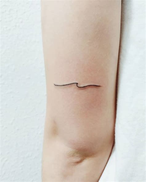 Simple Wave Tattoo on Arm by ilustralartattoo