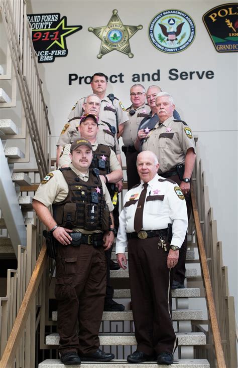 Grand Forks County Sheriff's Department wearing pink badges for breast ...