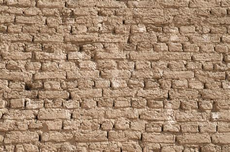 Ancient adobe wall closeup stock photo. Image of clay - 138581954