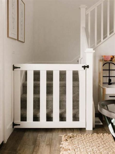 A baby gate is a protective barrier that stops toddlers and babies from ...