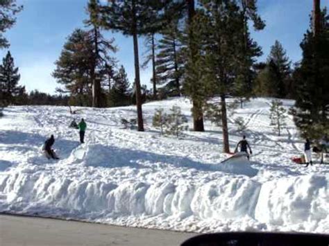 Kids make snow jump in Frazier Park - YouTube