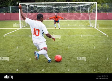 Soccer player taking penalty kick Stock Photo, Royalty Free Image ...