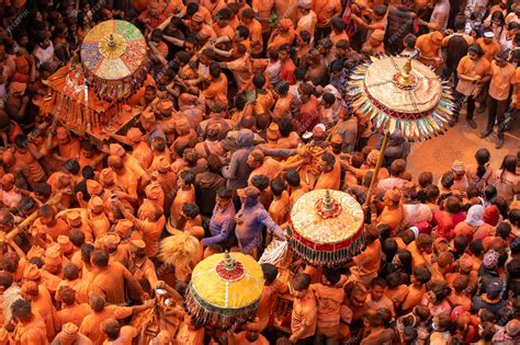 Premium Photo | A crowd of people with orange paint on their shirts and ...