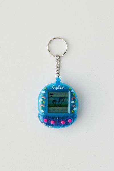 a keychain shaped like an old gameboy