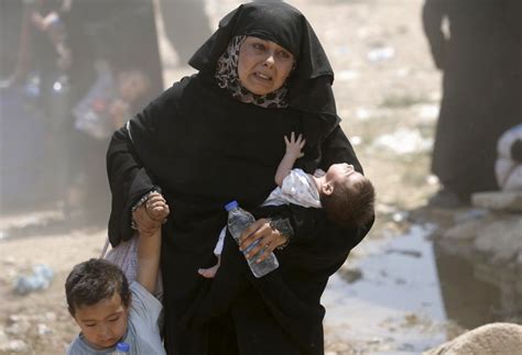 ISIS Executes Pregnant Mother, Kidnaps Her 4 Children for Trying to ...