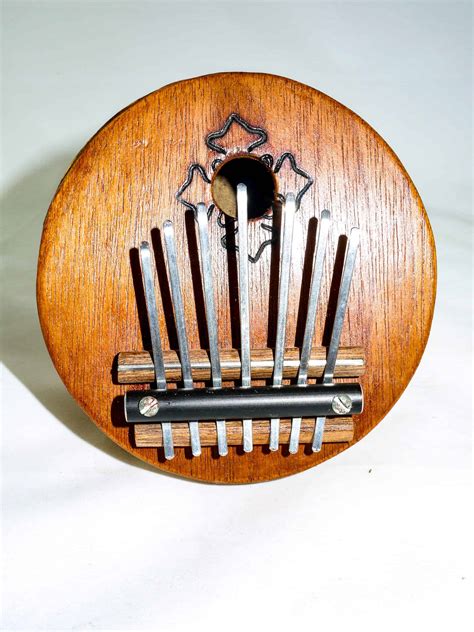 Kalimba 7-Tine Thumb Piano Instrument - Salvador Guidebook