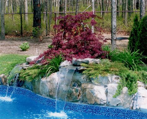 Backyard renovations landscaping inground pool with waterfall – Niagara ...