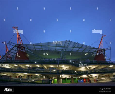 Mbombela stadium at night showing the giraffe-like structures holding ...