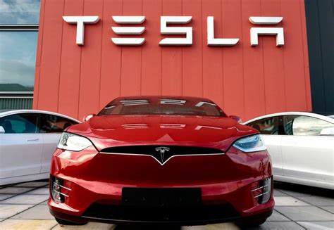 Tesla recalls 120,000 cars over faulty doors that could open during a ...