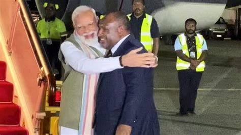 Watch: Papua New Guinea's Marape touches PM Modi's feet. BJP reacts ...